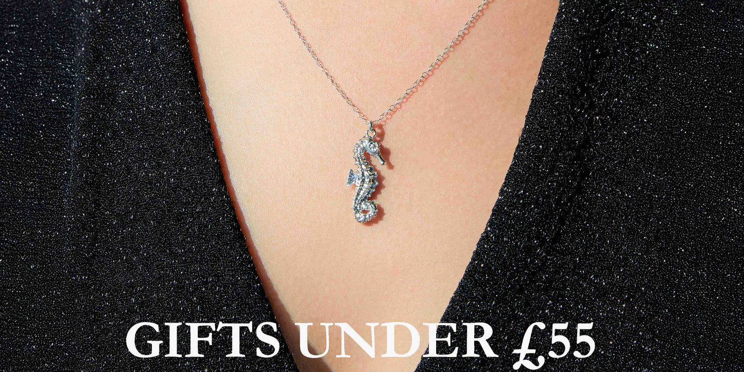 Close-up of seahorse pendant necklace in sterling silver from Otis Jaxon - featured in the Gifts Under £55 collection.