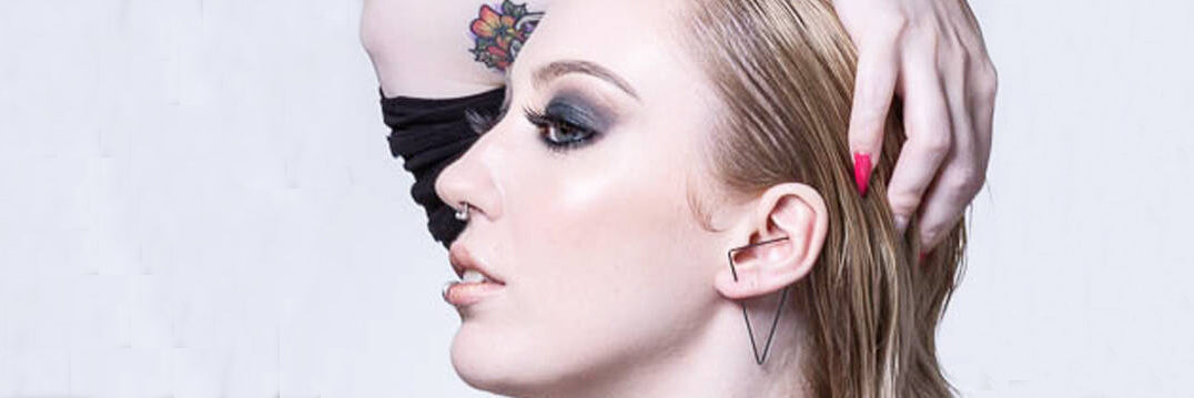 Oxidised silver triangle ear climbers styled on model