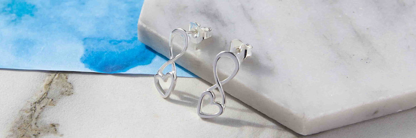 Close up image of Heart and infinity Drop Stud Dangle Earrings