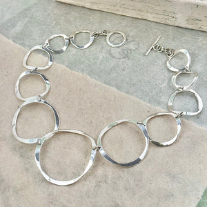 
            
                Load image into Gallery viewer, Statement Circle Links Graduated Sterling Silver Necklace
            
        