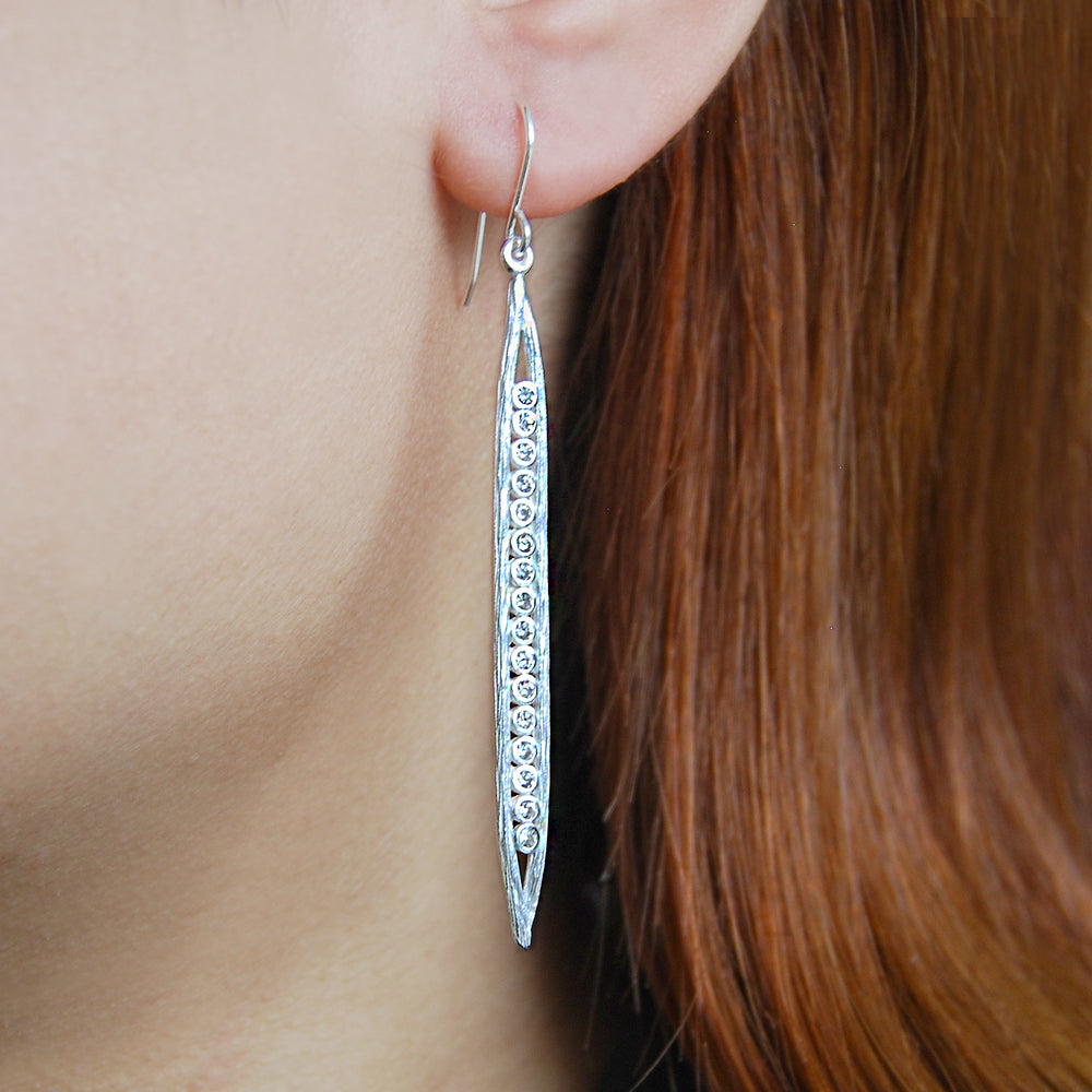 
            
                Load image into Gallery viewer, White Topaz Sterling Silver Pod Statement Earrings
            
        