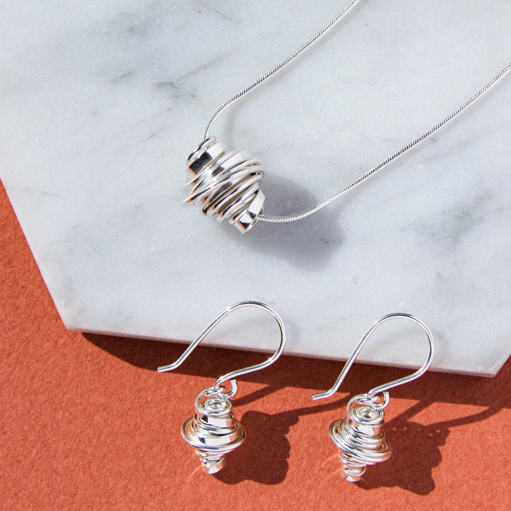 
            
                Load image into Gallery viewer, Coiled Silver Drop Earrings and Necklace - Otis Jaxon Silver Jewellery
            
        