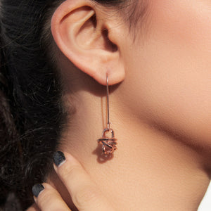 
            
                Load image into Gallery viewer, Long Knot Charm Rose Gold Drop Earrings
            
        