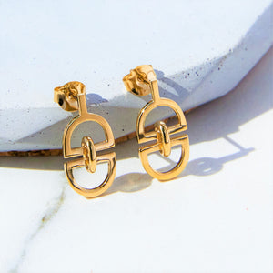 
            
                Load image into Gallery viewer, Interlinked &amp;#39;D&amp;#39; Charm Gold Plated Silver Stud Earrings
            
        