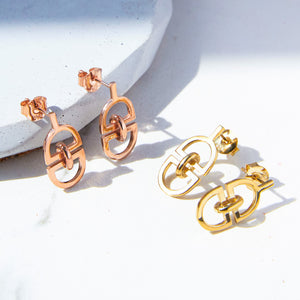 
            
                Load image into Gallery viewer, Interlinked &amp;#39;D&amp;#39; Charm Gold Plated Silver Stud Earrings
            
        
