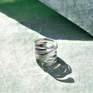 Gold sterling silver wrap ring for women.