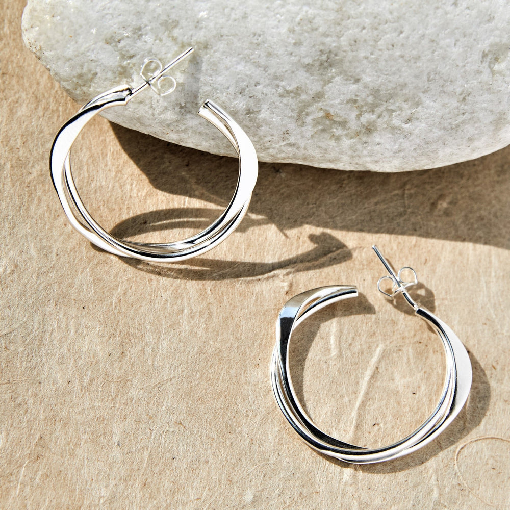 
            
                Load image into Gallery viewer, Interwoven Silver Hoop Earrings - Otis Jaxon Silver Jewellery
            
        