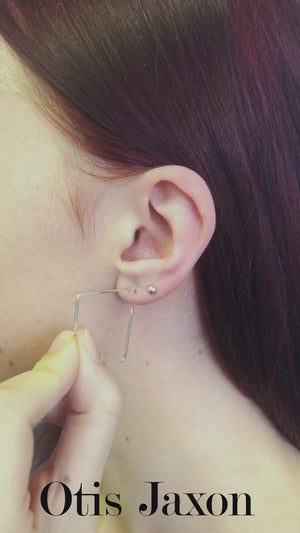 
            
                Load and play video in Gallery viewer, How to wear our silver square ear cuff earrings
            
        