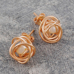 
            
                Load image into Gallery viewer, Caged Pearl Rose Gold Stud Earrings in White - Otis Jaxon Silver Jewellery
            
        