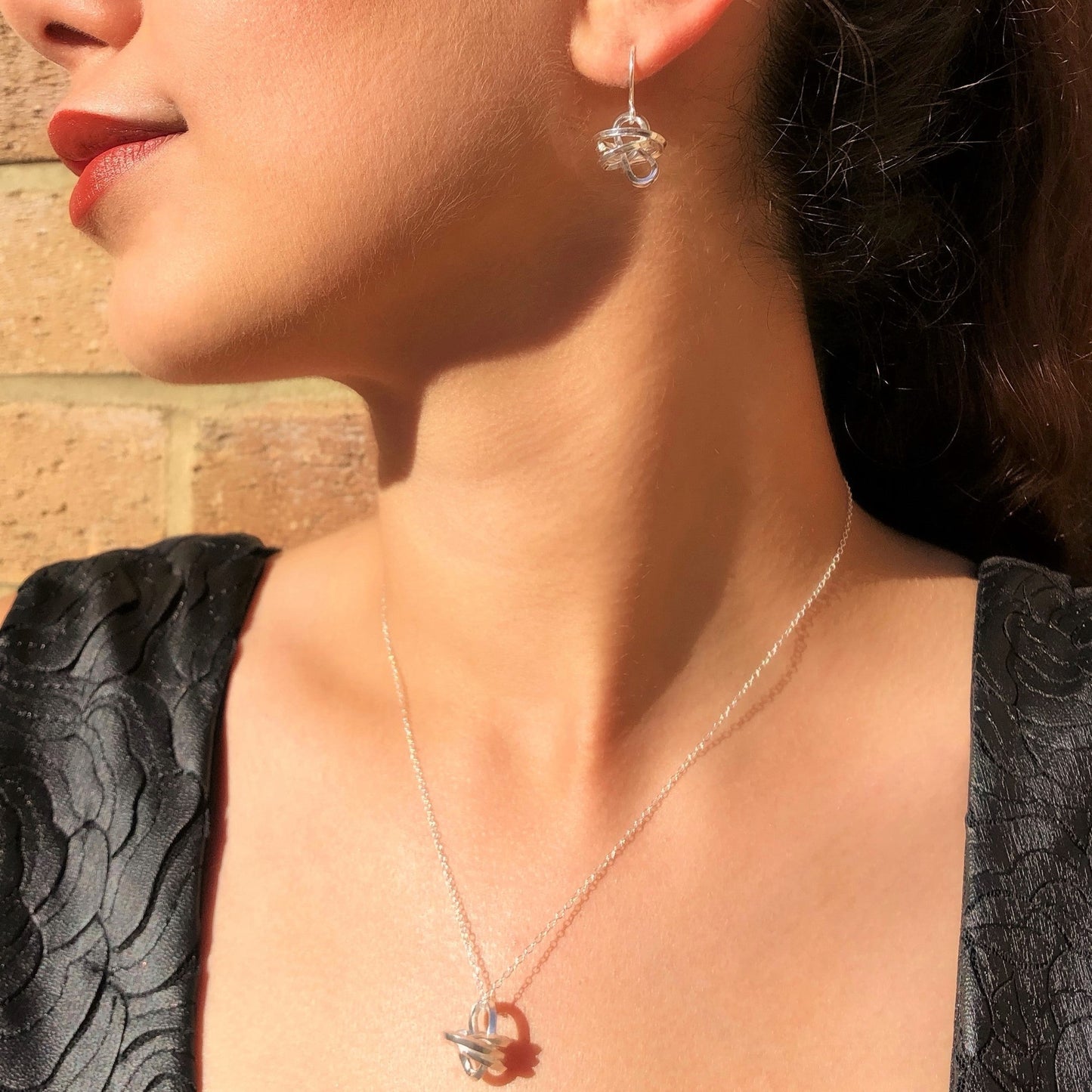 Coiled knot sterling silver pendant necklace and drop earring jewelry set