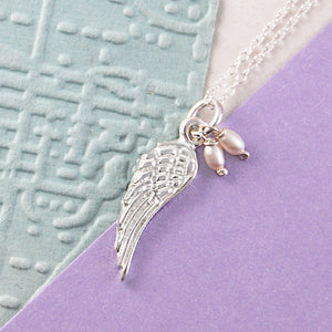 
            
                Load image into Gallery viewer, Pearl and Silver Angel Wing Necklace - Otis Jaxon Silver Jewellery
            
        