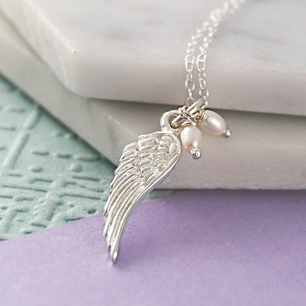 
            
                Load image into Gallery viewer, Pearl and Silver Angel Wing Necklace - Otis Jaxon Silver Jewellery
            
        
