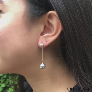 
            
                Load and play video in Gallery viewer, Sterling Silver Long Ball Ear Jackets
            
        
