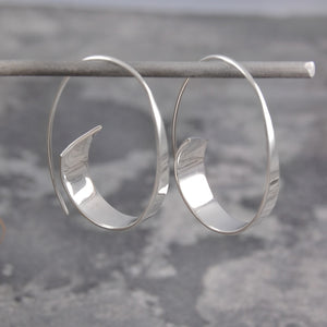 
            
                Load image into Gallery viewer, Curled Ribbon Silver Hoop Earrings - Otis Jaxon Silver Jewellery
            
        