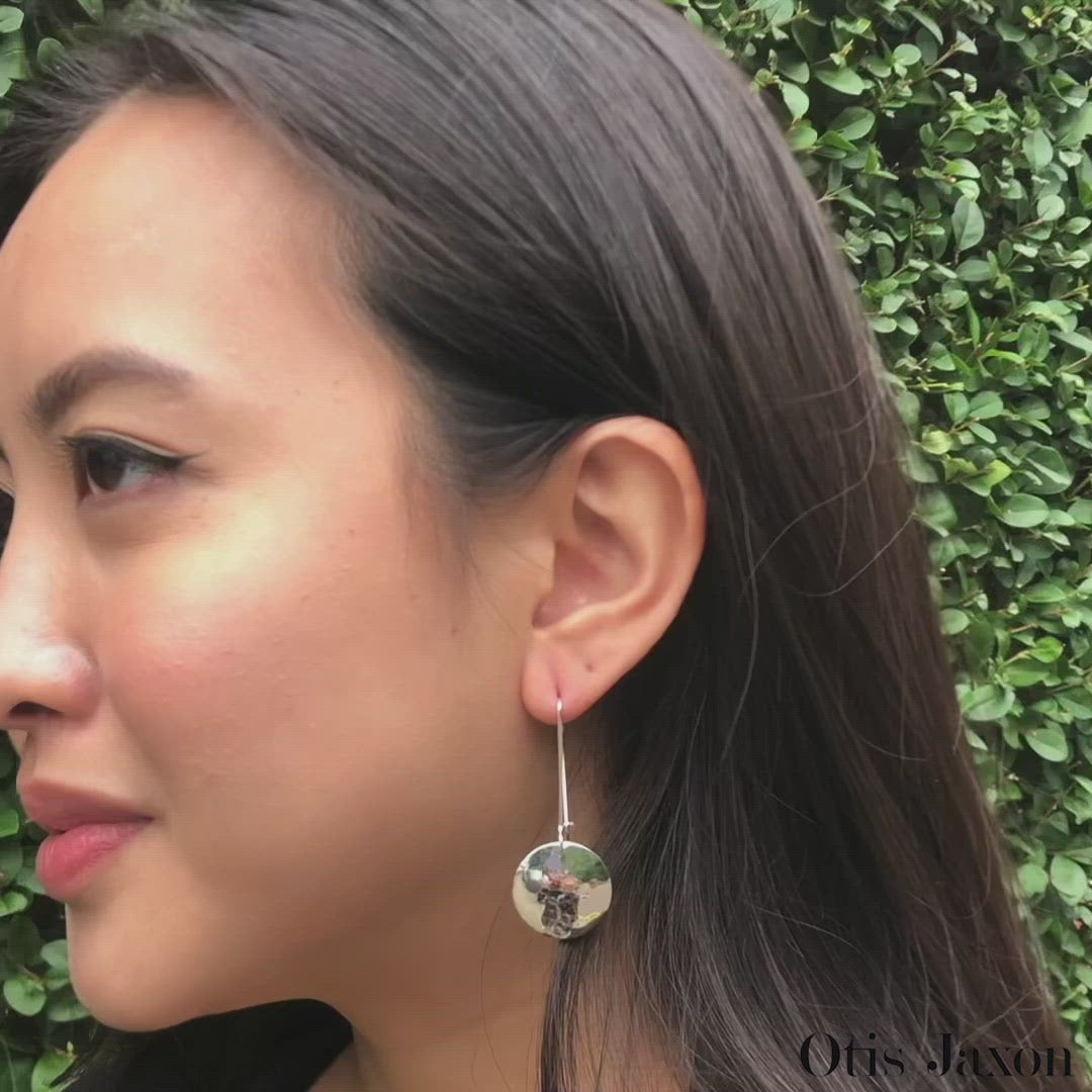 Handmade sterling silver hammered disc drop earrings