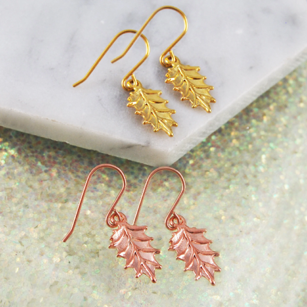 Holly Leaf Seasonal Drop Earrings in Yellow and Rose Gold.