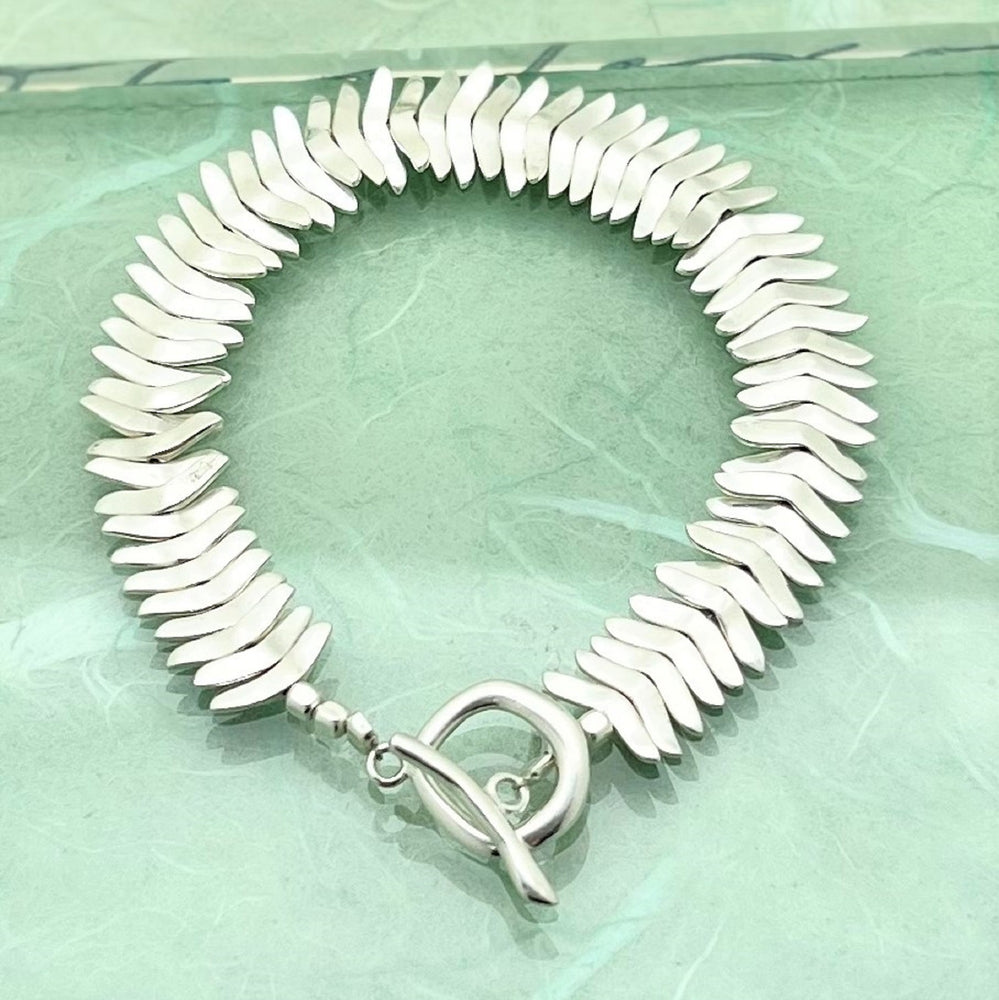 
            
                Load image into Gallery viewer, Chunky Silver Leaf Bracelet - Otis Jaxon Silver Jewellery
            
        