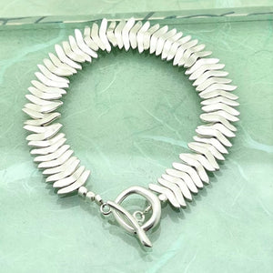 
            
                Load image into Gallery viewer, Chunky Silver Leaf Bracelet - Otis Jaxon Silver Jewellery
            
        
